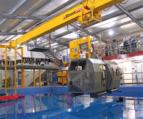 0-heli2.jpg Crane lifting helicopter